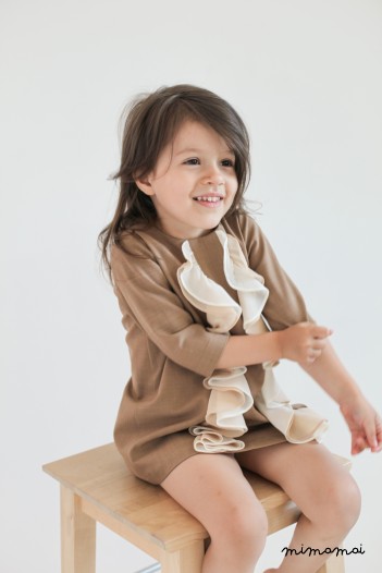 Warm beige girl dress with chiffon ruffles