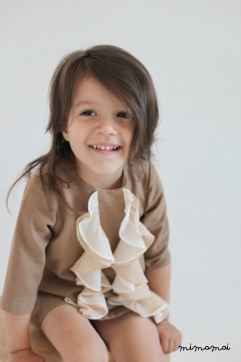 Warm beige girl dress with chiffon ruffles