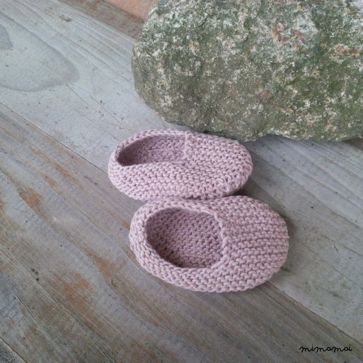 Baby shoes and knitted rabbit, handmade knitwear of organic cotton, pale rose