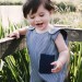 Baby dungarees with purple pocket