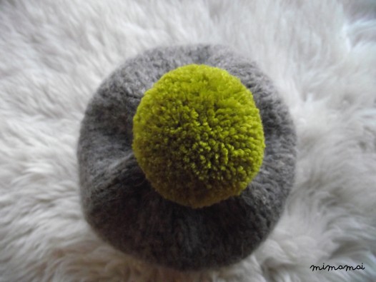 Hat with pom-pom