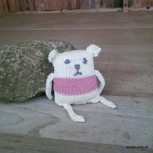 Baby shoes and knitted bear, handmade knitwear of organic cotton, wooden pink and off white