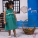 Baby dress in dark jade with polka dots