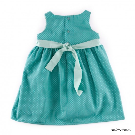 Baby dress in dark jade with polka dots