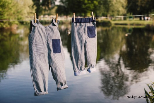 Baby dungarees with purple pocket