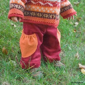 Cherry corduroy pants with big semicircle pockets