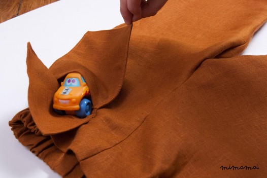 Linen terracotta trousers with a hanging pocket