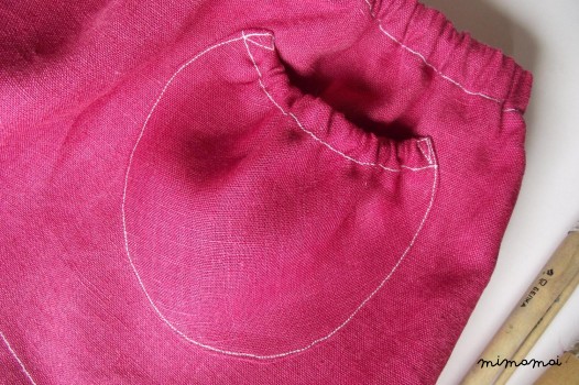 Raspberry red linen skirt with puffed pocket