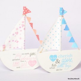 Wooden boat with fabric flag