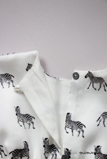 Vanilla baby dress with zebra print