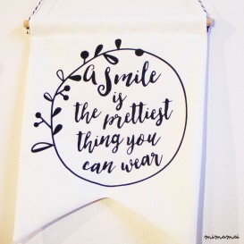 Wall Banner "A Smile is the prettiest thing you can wear"