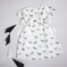 Vanilla baby dress with zebra print