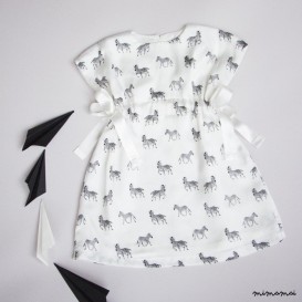 Vanilla baby dress with zebra print