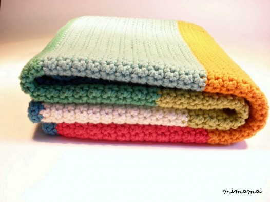 crochet baby blanket in colorful stripes
